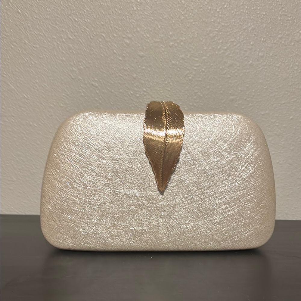 Elegant Cream Clutch with Gold Accent
